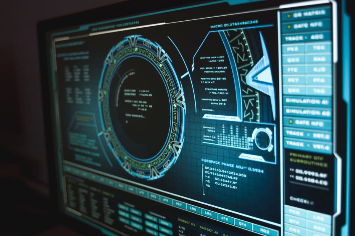 A futuristic on-screen interface reading verifying data with circular diagnostic graphics